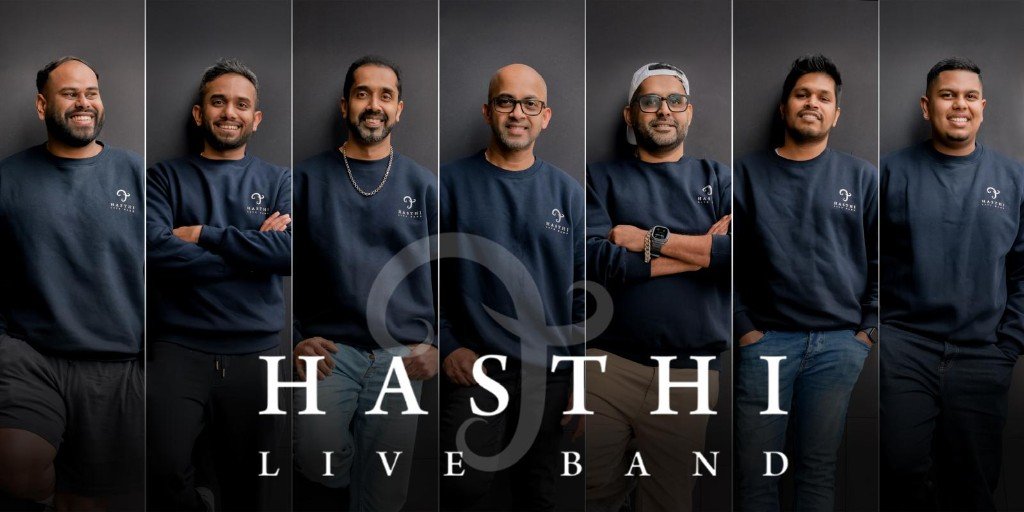 Hasthi Live Band members in matching navy sweatshirts